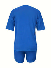 Set aus einfarbigem geripptem T-Shirt und Bikershorts